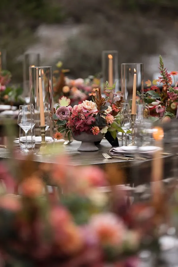 Beautifully decorated farm tables with candles